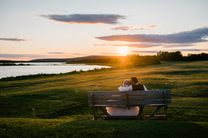 Bride and Groom enjoy sunset after wedding at Grand Falls Golf Course