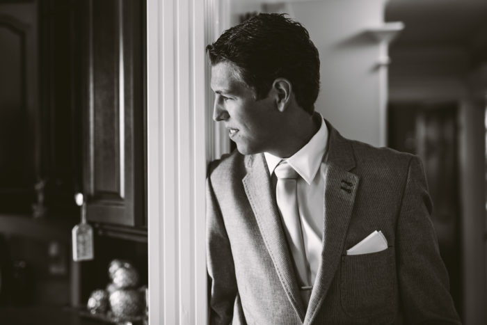 Groom waiting patiently on the morning of his wedding. Lewisporte Newfoundland and Labrador