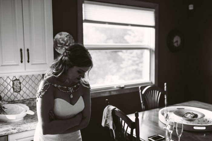 Bride patiently waits for her wedding ceremony in Portugal Cove - St. Phillips Newfoundland and Labrador