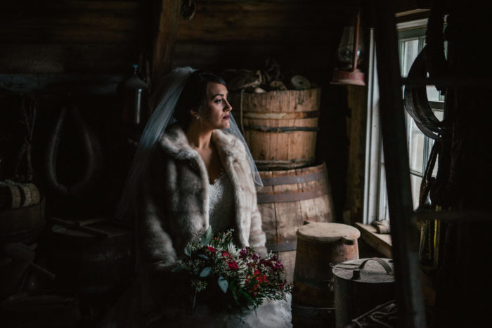 Rustic Bridal portrait in woodshed in Twillingate Newfoundland and Labrador