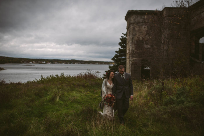 Bride and groom exploring the old mill in Campbelltown Newfoundland and Labrador