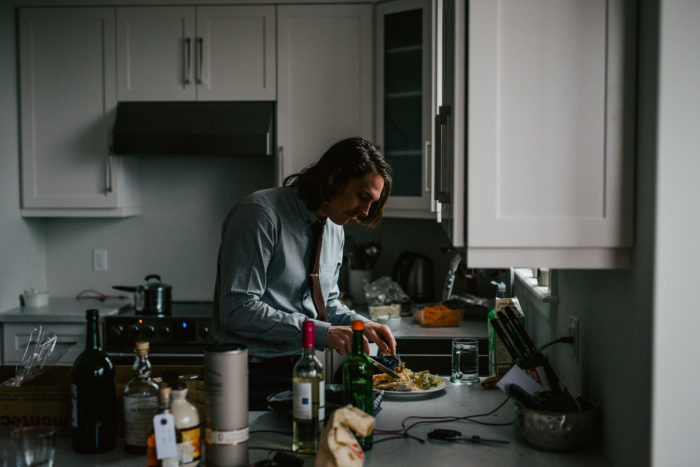 Groom enjoys some leftovers before the wedding in St. John's Newfoundland and Labrador